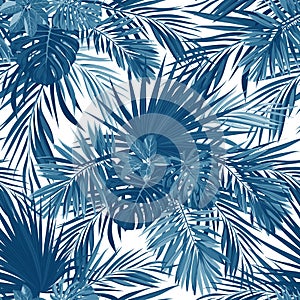 Tropical background with jungle plants. Vector seamless tropical pattern with indigo blue phoenix palm leaves.