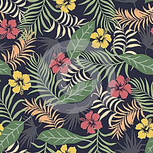 Tropical background with palm leaves and flowers. Seamless floral pattern. Summer vector illustration.