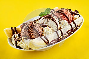 Tropical banana split with chocolate drizzle