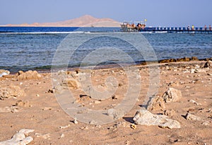 Tropical bay with a wooden jetty or pier