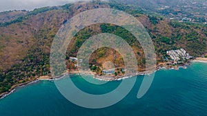 Tropical beach aerial view in Thailand. Drone photo. Landscape. Rainy day. Cloudy