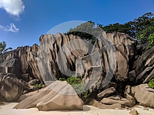 Tropical beach Anse Source d`Argent with granite boulders, La Digue Island, Seychelles