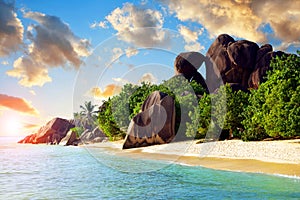 Tropical beach Anse Source d`Argent at sunset. La Digue Island, Indian Ocean, Seychelles.