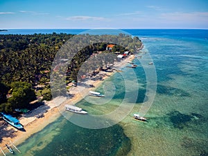 Tropical beach with boats and a beautiful view from the top