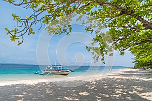 Tropical beach with boats on the Dibutonay Island, Busuanga