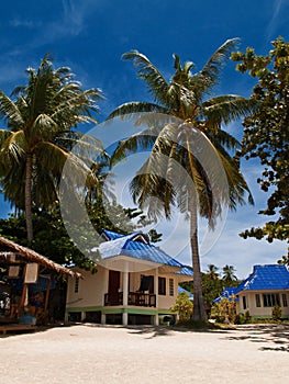 Tropical beach bungalows photo