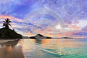 Tropical beach Cote d'Or at sunset, Seychelles photo