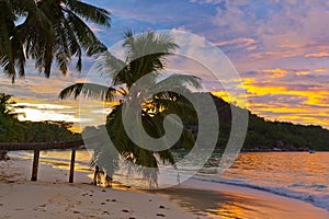 Tropical beach Cote d'Or at sunset - Seychelles photo