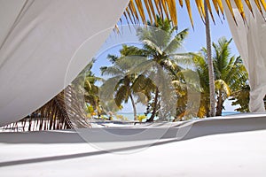 Tropical beach with curtains