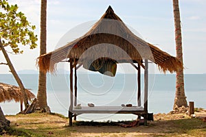 Tropical beach hut in Thailand photo