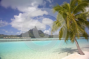 Tropical beach & lagoon, Bora Bora, French Polynesia.