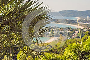 Tropical beach landscape panorama. Beautiful turquoise ocean waives with boats and sandy coastline from high view point