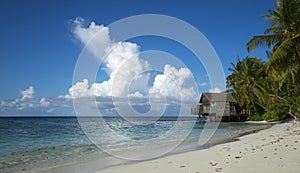 Tropical beach. Ocean waves and cloudy sky background. White san