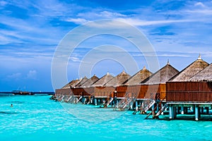 Tropical Beach and Overwater Bungalow