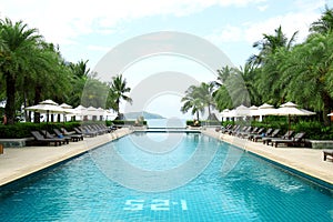 Tropical beach resort hotel swimming pool