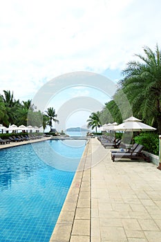 Tropical beach resort hotel swimming pool