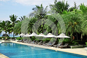 Tropical beach resort hotel swimming pool