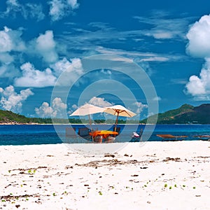 Tropical beach at Seychelles with picnic table