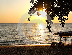 Tropical beach at sunset