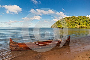 Tropical beach with traditional boat near Nosy Be, Madagascar