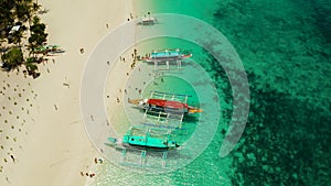 Tropical beach and turquoise lagoon water