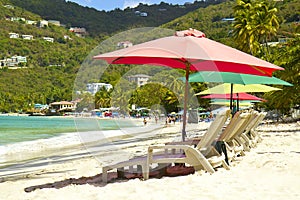 Tropical beach with umbrellas, Cane Garden Bay, Tortola, Caribbean