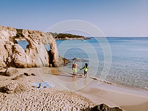 Tropical beach of Voulisma beach, Istron, Crete, Greece, couple on vacation in Greece