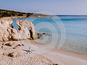 Tropical beach of Voulisma beach, Istron, Crete, Greece, couple on vacation in Greece