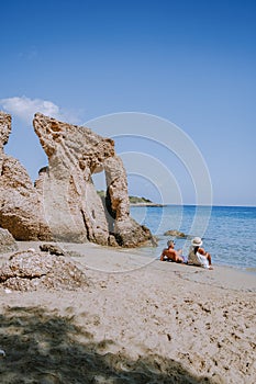 Tropical beach of Voulisma beach, Istron, Crete, Greece, couple on vacation in Greece photo