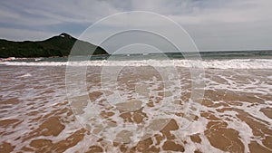 Tropical beach - waves and sand, steadicam