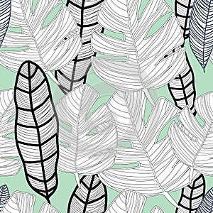 Tropical black and white leaves on green background seameless repeat.