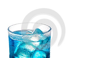 Tropical blue alcoholic cocktail isolated on a white background