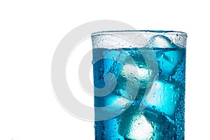 Tropical blue alcoholic cocktail isolated on a white background