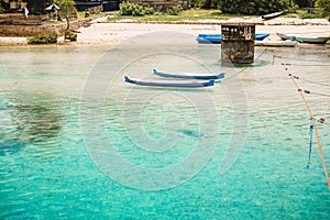 Tropical blue ocean and boats in Indonesia