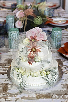 A beautiful and delicious wedding cake. photo