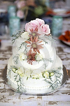 A beautiful and delicious wedding cake. photo