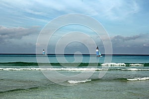 Tropical caribbean beach and emerald water landscape as a background.