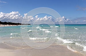 Tropical caribbean beach and emerald water landscape as a background.