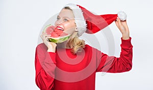 Tropical christmas concept. Christmas summer destinations. Woman santa hat hold slice watermelon. Prolong summer