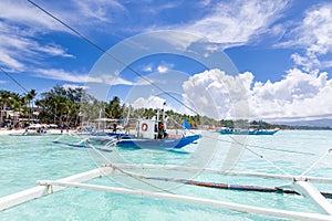 Tropical clear sea with dramatic sky view from Philippine traditional boat