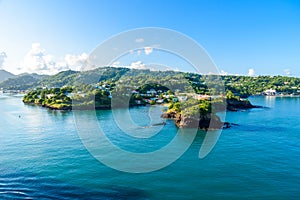 Tropical coast on the Caribbean island of St. Lucia. It is a paradise destination with a white sand beach and turquoiuse sea photo