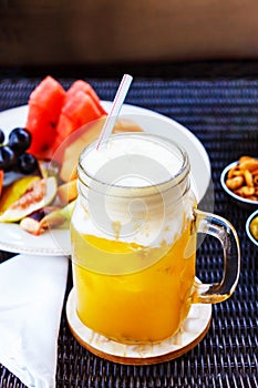 Tropical cocktail, mocktail, juice, refreshing drink from passion fruits. photo