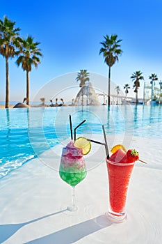 Tropical cocktails in resort infinity pool