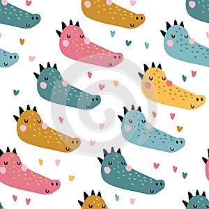 Tropical crocodile. Seamless pattern with cute animals faces. Childish print for nursery in a Scandinavian style. For