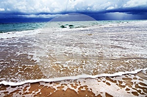 Tropical dangerous storm over ocean water beach