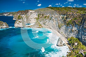 Tropical Diamond beach with coconut palms and cliff