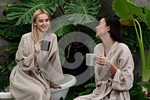 Tropical and exotic spa garden with bathtub in modern hotel or resort. Blithe