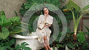 Tropical and exotic spa garden with bathtub in modern hotel or resort. Blithe