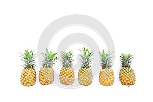 Tropical food composition made of pineapple fruits on white background. Flat lay, top view