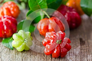 Tropical fruit also called Pitanga, Brazilian Cherry photo